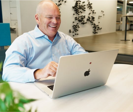 Scott Blanchard at desk