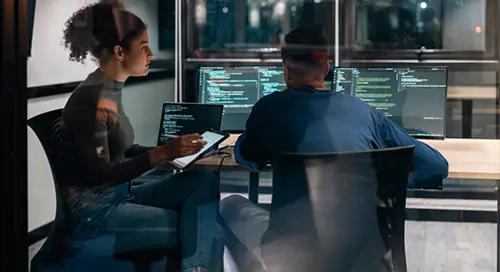 coworkers reviewing computer data