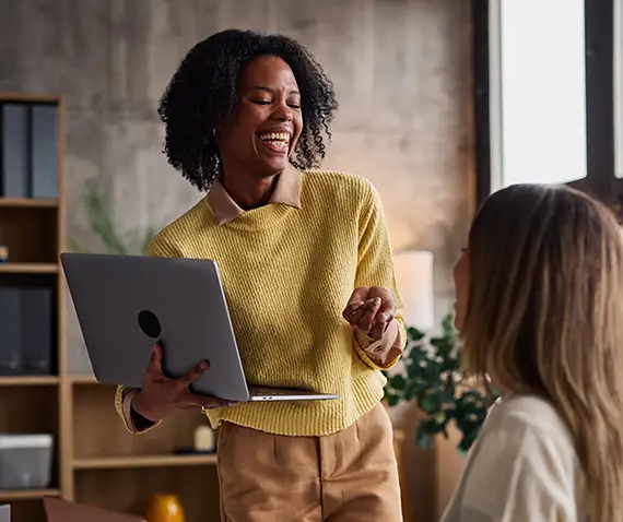 smiling coworkers in a meeting