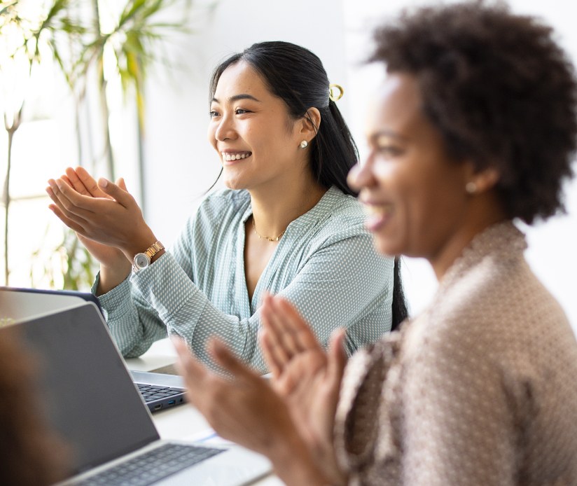 women applauding