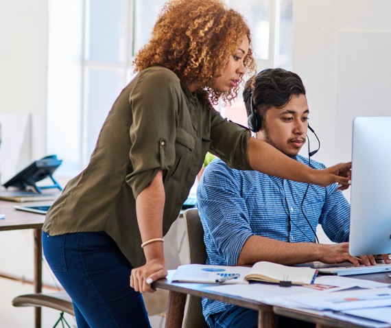 people working together at computer