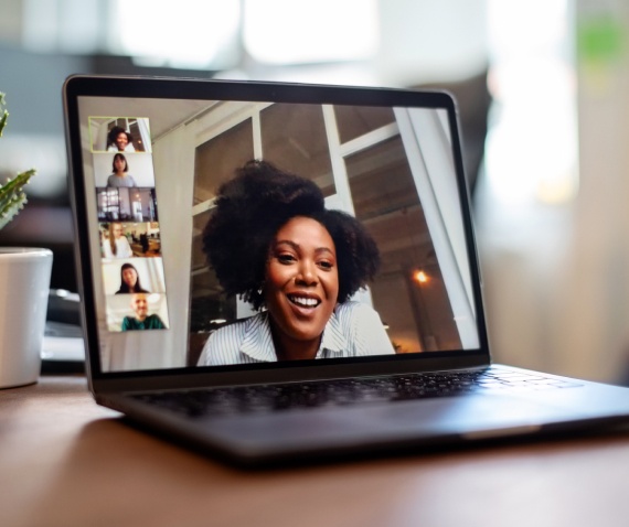 women's image on laptop screen