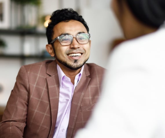 Smiling man in conversation