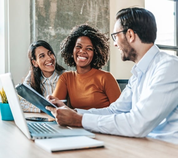 three people laughing